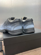 Unisex sneakers heel view, light blue leather with Chanel CC logo on side