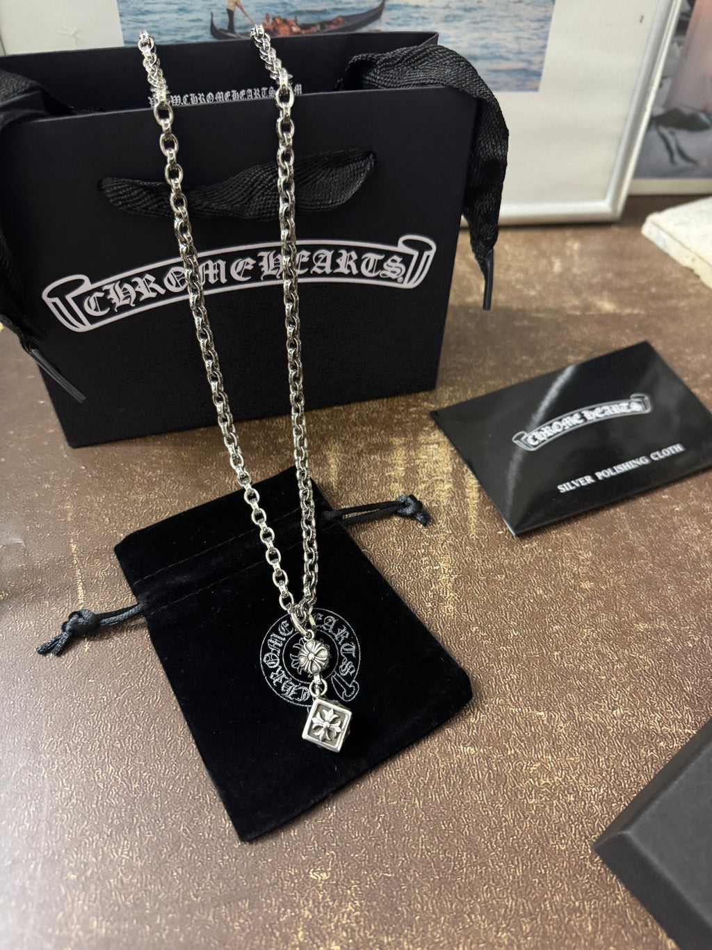 Chrome Hearts pendant necklace set with two silver-tone chains and charms