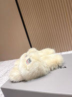 Faux fur slide sandal with Balenciaga logo on cream strap