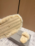 Faux fur slide sandal outsole with textured tread