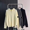 Cream cable-knit zip hoodie sweater with hood, ribbed cuffs and hem
