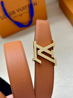 Louis Vuitton tan leather belt with gold-tone LV buckle and end tab