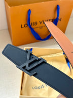 Louis Vuitton dark navy leather belt with silver-tone LV buckle detail