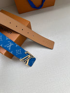 Blue monogram Louis Vuitton belt with silver LV buckle and punched holes
