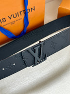 Louis Vuitton monogram belt with large dark LV buckle detail