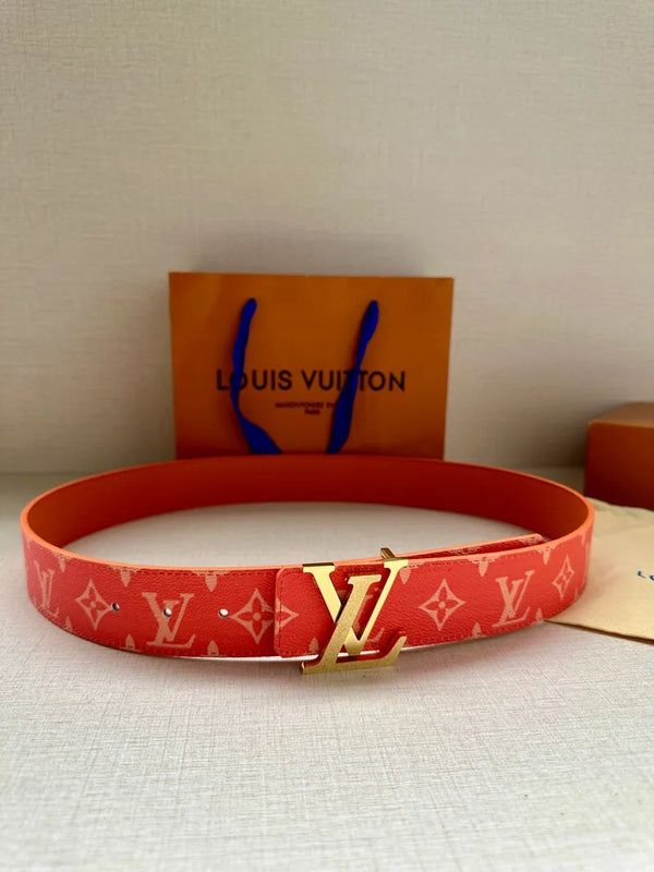 Louis Vuitton red monogram belt with gold-tone LV buckle, laid flat
