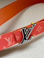 Louis Vuitton belt strap in orange leather with large silver-tone LV buckle