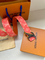 Louis Vuitton belt in red monogram canvas with oversized LV buckle