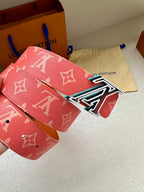 Louis Vuitton belt in red monogram canvas with silver-tone LV buckle detail