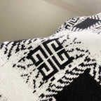 Givenchy knit sweater with large black-and-white geometric emblem pattern