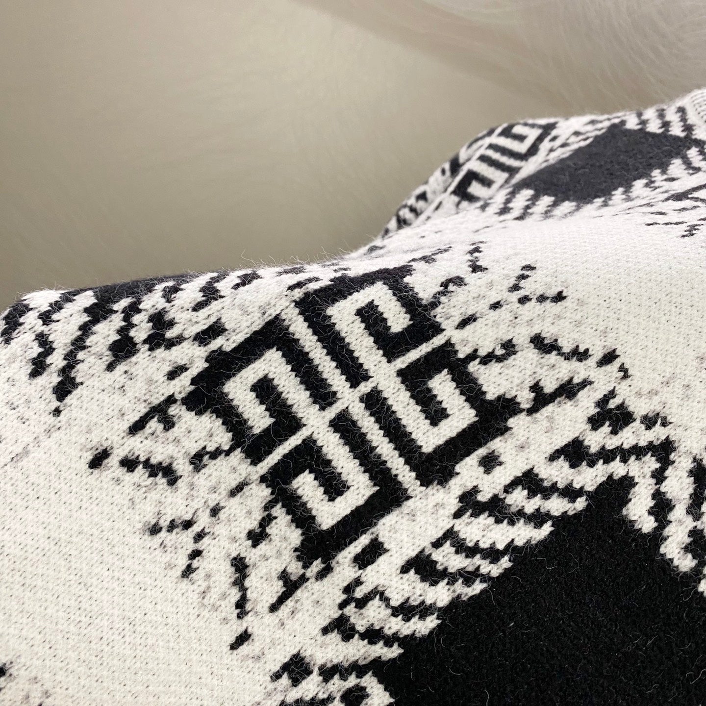 Givenchy knit sweater with large black-and-white geometric emblem pattern