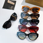 Collection of Bvlgari sunglasses, assorted frames and tinted lenses on display