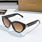 Bvlgari cat-eye sunglasses, black frames, brown lenses, gold emblem bridge