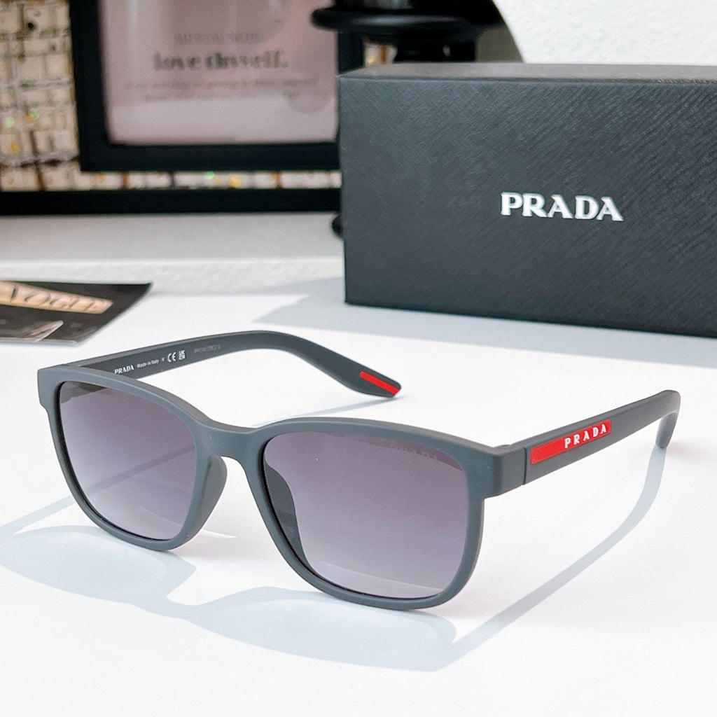Prada glasses with dark frames and purple-tinted lenses, red logo temple detail