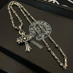 Silver-tone chain necklace set with cross star pendant and small bead-link accents