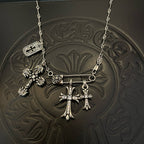 Silver-tone multi-cross pendant necklace with chain and hanging charms