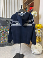 Dior hooded zip jacket in dark navy with “CHRIST” and “DIOR” chest lettering