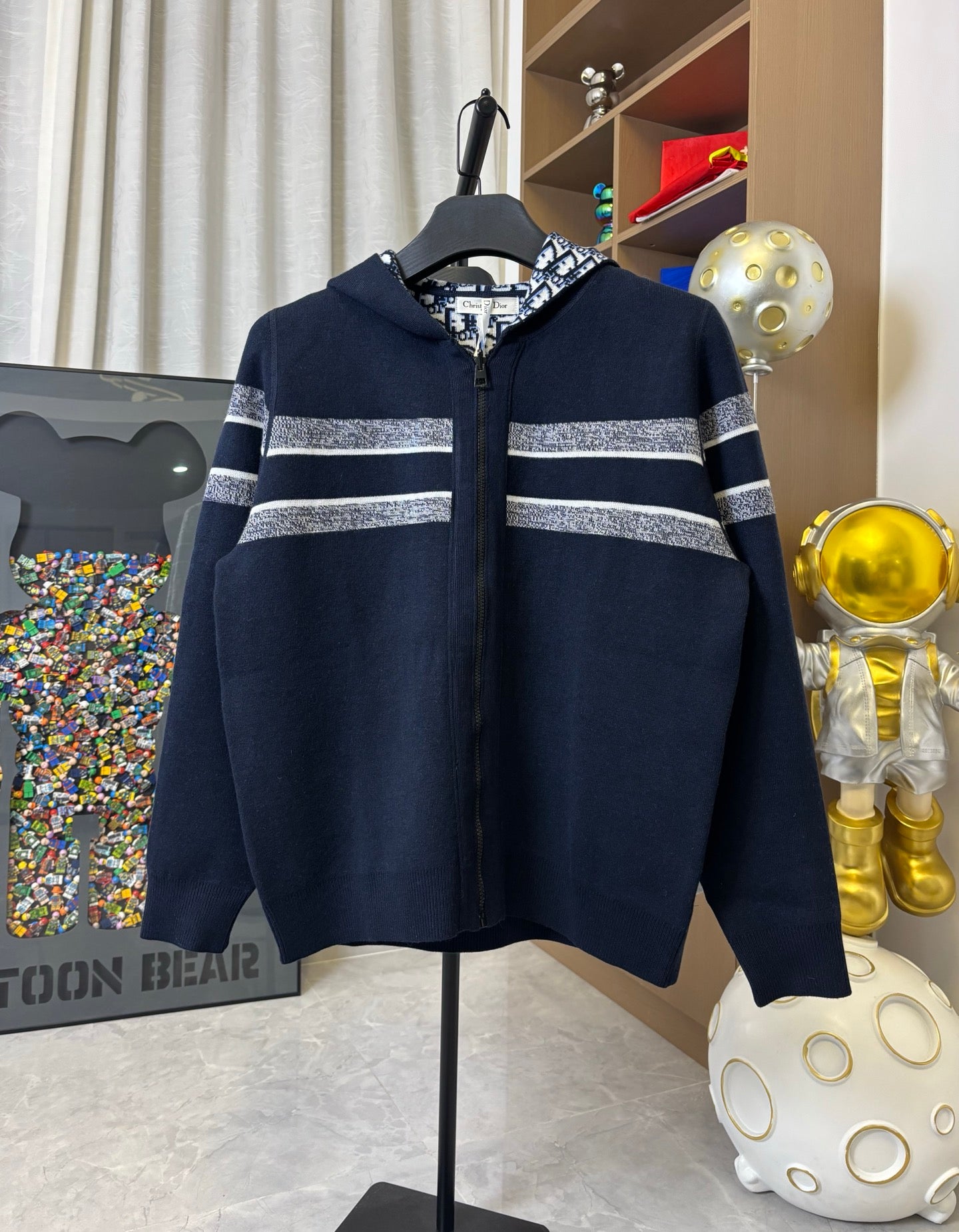 Dior hooded zip jacket in dark navy with striped bands and patterned hood lining