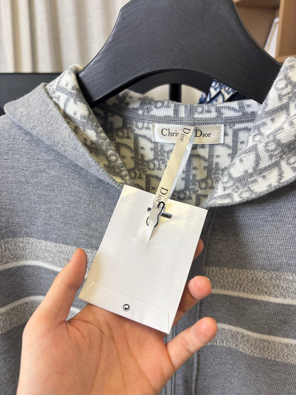 Dior grey knit zip-up top with monogram-lined collar and hanging tag