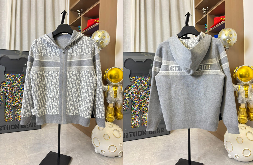 Two gray hoodies on hangers: one striped, one with Dior logo print