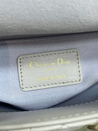 Dior logo label on bag interior reading “Christian Dior Paris” and “Made in Italy”