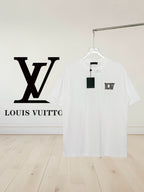 White Louis Vuitton T-shirt on hanger with small LV chest logo
