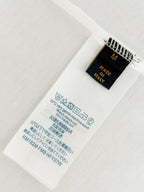 White Louis Vuitton T-shirt care label and size tag on inside fabric