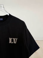 Louis Vuitton short-sleeve T-shirt in black with gold LV letter print