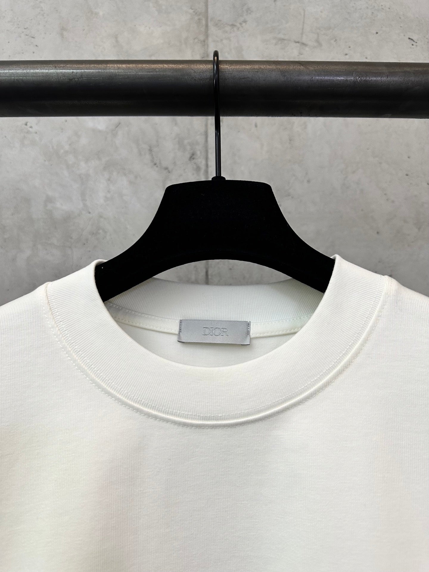 White crewneck T-shirt neckline with inner neck label