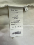 Inside care label: 100% cotton, size S, dry clean instructions