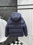 Dark blue puffer jacket with hood, rear view, and rounded shoulders