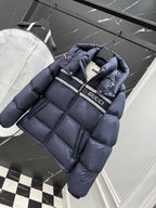 Dark blue long puffer jacket with hood, zipper, Gucci logo stripe and gold accents