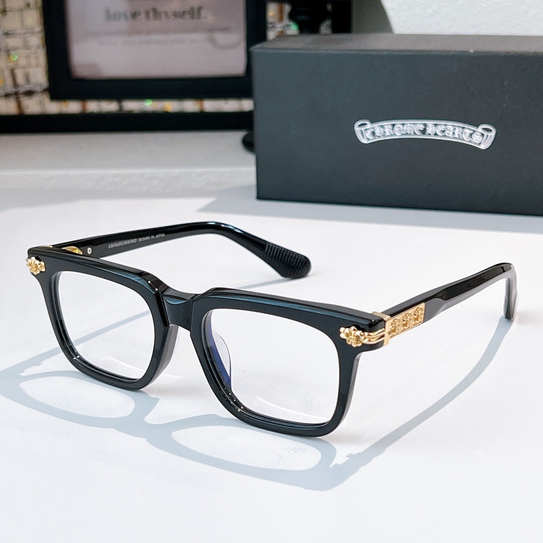Green eyeglasses with square frames and rhinestone-like temple accents