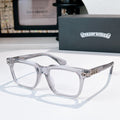 Clear eyeglasses with square frames and silver-tone temples, decorative hinge