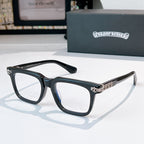 Dark eyeglasses with square frames and gold-tone patterned temple detail