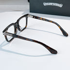 Tortoise-shell eyeglasses with square frames and silver-tone hinge detail