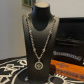 Silver-tone pendant necklace with round medallion and linked chain