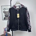 Burberry zip-up hooded jacket in dark navy with plaid hood lining and front pockets
