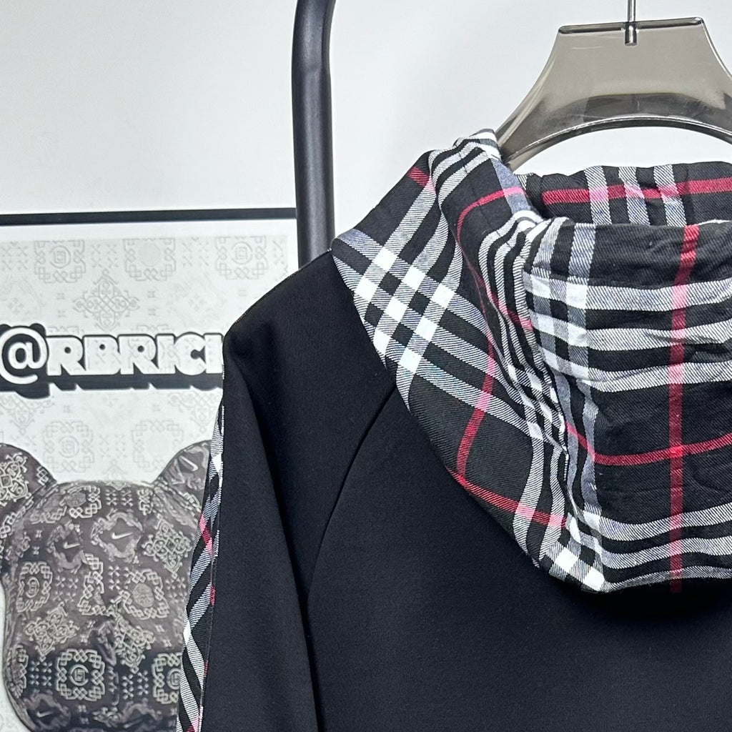 Dark navy hooded zip jacket with plaid hood lining and drawstring detail