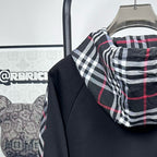 Dark navy hooded zip jacket with plaid hood lining and drawstring detail