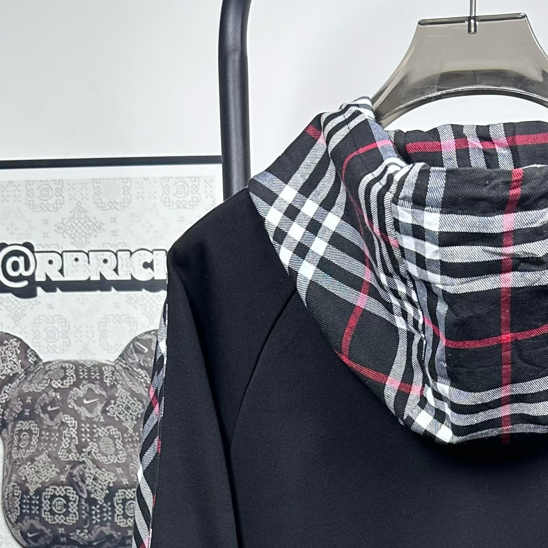 Dark navy hooded zip jacket with plaid hood lining and drawstring detail