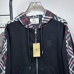 Dark navy hooded zip jacket with plaid hood, front zipper, and small logo patch
