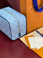 Louis Vuitton light blue monogram crossbody bag with side zipper and blue strap