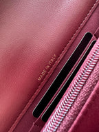 Burgundy leather interior label and twin card slots, MADE IN ITALY