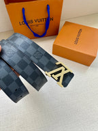 Louis Vuitton checkered leather belt with LV buckle and second strap piece.