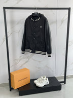 Prada black hooded bomber jacket, snap front and striped ribbed trim