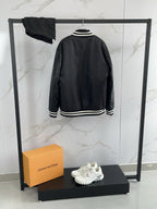 Prada black hooded bomber jacket, striped ribbed waistband and back panel