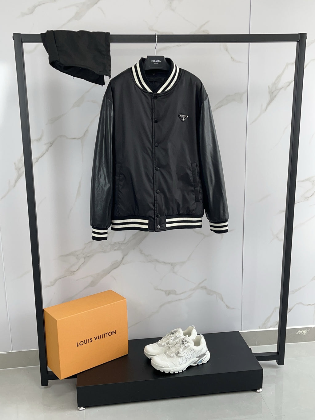 Prada black hooded bomber jacket with striped ribbed cuffs and logo