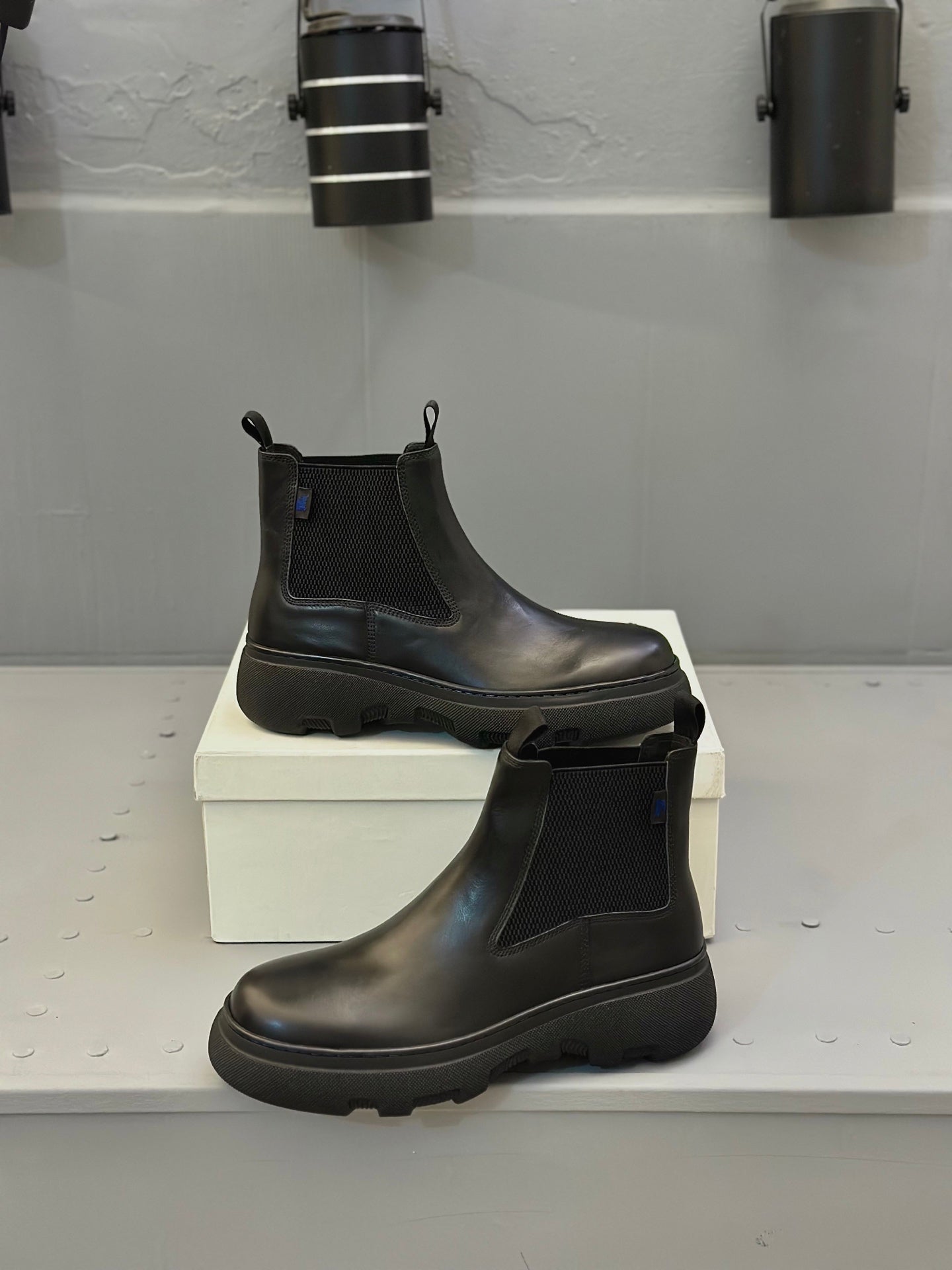 Black leather ankle Chelsea boots with elastic side and low heel