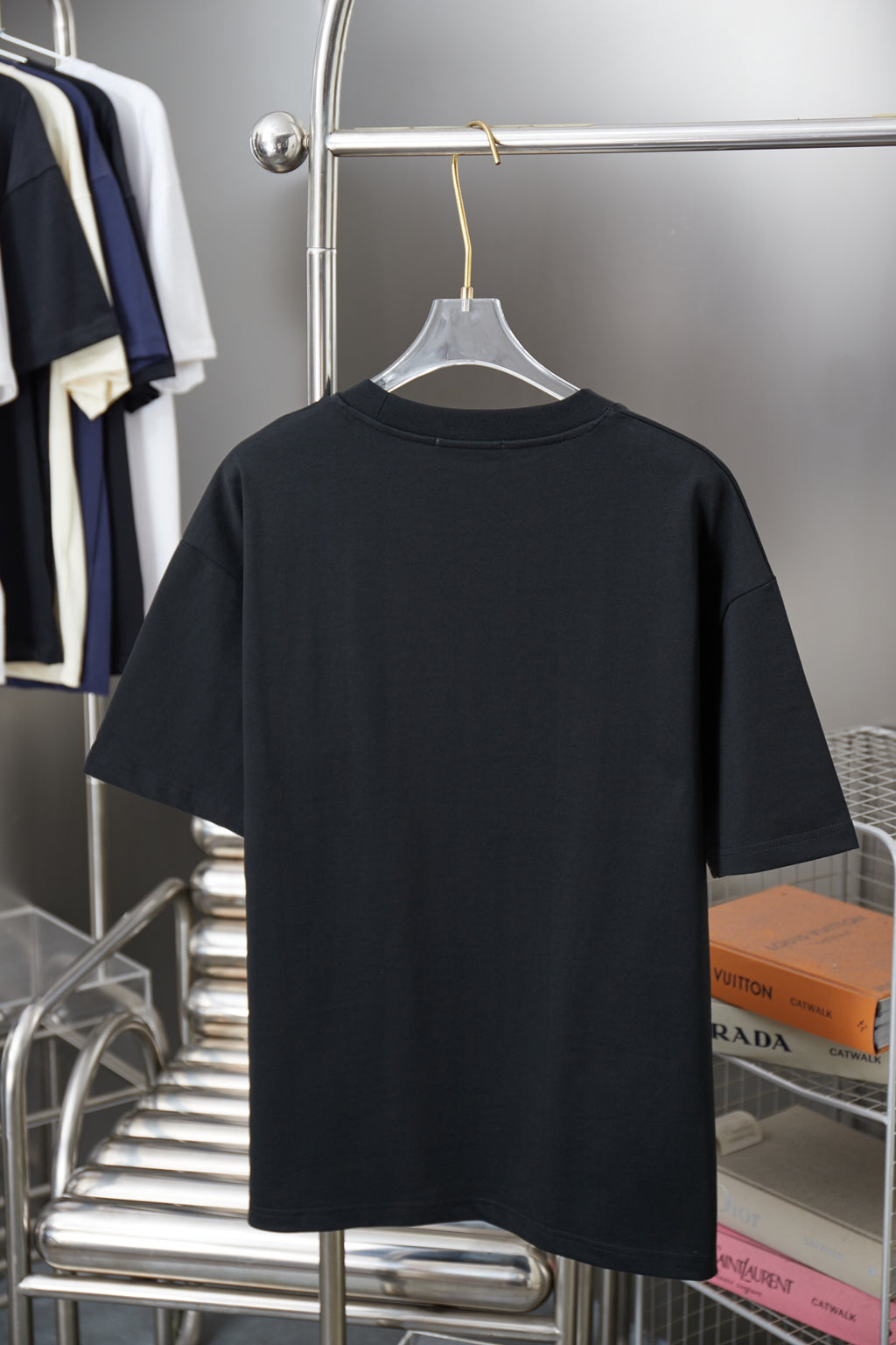 Black Prada short-sleeve T-shirt back view on hanger